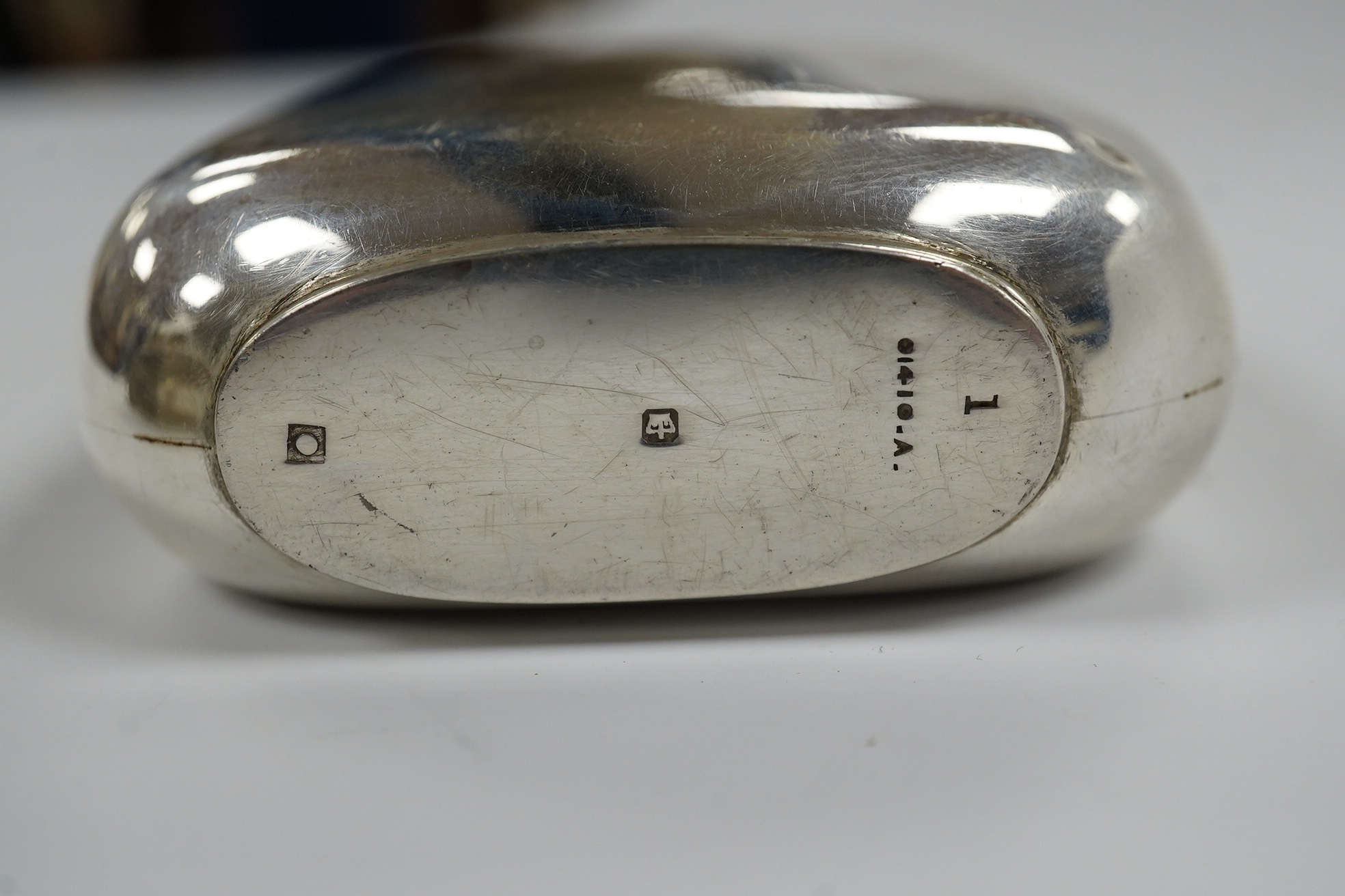 A late Victorian silver hip flask, by James Dixon & Sons, Sheffield, 13.3cm, 5.3oz. Condition - poor